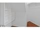 Spacious walk-in closet with built-in shelves at 102 Choptank Ct # B5, Cary, NC 27513