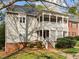 Inviting two-story condo with a lattice-covered porch and well-maintained landscaping at 102 Choptank Ct # B5, Cary, NC 27513