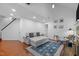 Comfortable living room with hardwood floors, cozy seating, and a fireplace at 102 Choptank Ct # B5, Cary, NC 27513