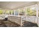 Charming outdoor porch with lattice railings, providing a relaxing view of the surrounding neighborhood at 102 Choptank Ct # B5, Cary, NC 27513