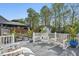 Serene backyard deck with comfortable seating and a gazebo, perfect for outdoor relaxation at 1039 S Philwood Ct, Fuquay Varina, NC 27526
