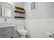 Powder room featuring stylish sink with a modern faucet, and decor accents at 1039 S Philwood Ct, Fuquay Varina, NC 27526