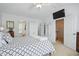 Bedroom featuring a king bed and doorway to bathroom at 1039 S Philwood Ct, Fuquay Varina, NC 27526
