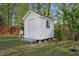 Well-maintained storage shed with classic design, perfect for storing tools and equipment at 1039 S Philwood Ct, Fuquay Varina, NC 27526