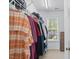 Walk-in closet with lots of hanging storage and natural light at 1039 S Philwood Ct, Fuquay Varina, NC 27526