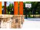 Outdoor basketball court with wooden posts and stone columns framing the view, great for recreation at 1140 Sun Springs Rd, Wake Forest, NC 27587