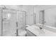 This bathroom offers a vanity, and walk-in shower with glass door at 1140 Sun Springs Rd, Wake Forest, NC 27587