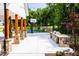 Community outdoor kitchen and basketball court surrounded by mature trees and landscaping at 1140 Sun Springs Rd, Wake Forest, NC 27587