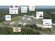 Aerial image of the commercial real estate property displaying community's layout and surrounding greenery at 120 Mosaic Blvd # 308, Pittsboro, NC 27312