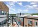 Expansive balcony view overlooking the city and greenery, highlighting outdoor living at 120 Mosaic Blvd # 308, Pittsboro, NC 27312