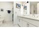 Modern bathroom with double vanity, quartz countertops, and glass-enclosed shower at 120 Mosaic Blvd # 308, Pittsboro, NC 27312