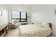 Bedroom with large windows, chair, side table, and modern decor at 120 Mosaic Blvd # 308, Pittsboro, NC 27312