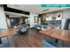 Resident clubhouse kitchen offers ample seating and modern appliances for social gatherings at 120 Mosaic Blvd # 308, Pittsboro, NC 27312