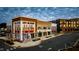 Exterior view featuring modern architecture, large windows, and street view at 120 Mosaic Blvd # 308, Pittsboro, NC 27312