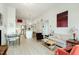 Inviting living space with open layout, featuring bright walls and a seamless flow into the modern kitchen at 120 Mosaic Blvd # 308, Pittsboro, NC 27312