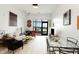 Comfortable living room with a bright atmosphere, balcony access, modern furnishings, and dining area at 120 Mosaic Blvd # 308, Pittsboro, NC 27312
