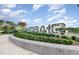 A modern, stylish 'MOSAIC' sign with landscaping at the commercial real estate property at 120 Mosaic Blvd # 308, Pittsboro, NC 27312
