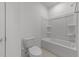 A clean, well-lit bathroom features a shower over tub, toilet, and tile floors at 1237 Porters Call Dr, Wendell, NC 27591