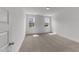 Bright bedroom features carpet flooring and double windows that let in natural light at 1237 Porters Call Dr, Wendell, NC 27591
