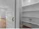 Walk-in pantry with ample shelving space for storage solutions at 1237 Porters Call Dr, Wendell, NC 27591