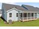 Cozy screened-in porch with a ceiling fan, offering a relaxing outdoor living space at 1237 Porters Call Dr, Wendell, NC 27591