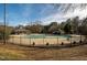 The community pool features a large pool, lounge area and bath house surrounded by a black metal fence at 1326 Apache Ln, Apex, NC 27502
