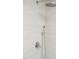 Close-up of shower fixtures and subway tile in modern, minimalist bathroom at 1326 Apache Ln, Apex, NC 27502