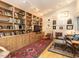 Cozy living room with built-in bookshelves and comfortable seating at 1604 Meadow Ln, Chapel Hill, NC 27516