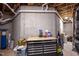 Unfinished basement showcasing the utilities and featuring workbench with storage drawers at 184 Wildfell Trl, Cary, NC 27513