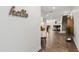 Welcoming foyer with hardwood floors and stylish decor leading to the living spaces at 184 Wildfell Trl, Cary, NC 27513