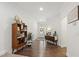 Bright foyer with hardwood flooring and elegant decor leading to the rest of the home at 184 Wildfell Trl, Cary, NC 27513