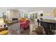 Stylish living room featuring hardwood floors, fireplace, and abundant natural light at 184 Wildfell Trl, Cary, NC 27513
