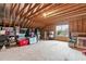 The attic is unfinished, with exposed rafters, and has a window at 200 Windy Knoll Cir, Chapel Hill, NC 27516