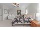 Cozy bedroom with bed, sitting area, and bright natural light from window at 200 Windy Knoll Cir, Chapel Hill, NC 27516