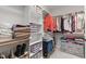 The walk-in closet boasts ample shelving and storage solutions at 200 Windy Knoll Cir, Chapel Hill, NC 27516