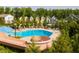 The community pool features a winding waterslide and lounge area with verdant landscaping at 200 Windy Knoll Cir, Chapel Hill, NC 27516