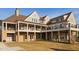 Multi-story clubhouse with stone accents and balcony at 200 Windy Knoll Cir, Chapel Hill, NC 27516