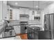 Well-equipped kitchen with stainless steel appliances and sleek countertops at 200 Windy Knoll Cir, Chapel Hill, NC 27516