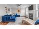 Inviting living room features a fireplace, comfortable seating and hardwood floors at 200 Windy Knoll Cir, Chapel Hill, NC 27516