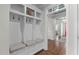 Functional mudroom featuring built-in storage, seating, and hooks at 200 Windy Knoll Cir, Chapel Hill, NC 27516