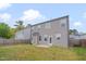 Exterior rear view of the home featuring a well-maintained yard and patio at 205 Loxton St, Fuquay Varina, NC 27526