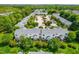 This is an aerial view showcases a dense neighborhood with manicured lawns and plenty of parking available at 2101 Piney Brook Rd # 105, Raleigh, NC 27614