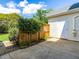 Patio and fenced backyard featuring lush greenery at 2101 Piney Brook Rd # 105, Raleigh, NC 27614