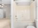 Bathroom with a corner jacuzzi-style tub and shower combo at 2101 Piney Brook Rd # 105, Raleigh, NC 27614