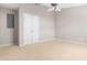 Neutral bedroom featuring a ceiling fan and a double-door closet at 2101 Piney Brook Rd # 105, Raleigh, NC 27614