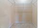 Walk-in closet with wire shelving and neutral carpet at 2101 Piney Brook Rd # 105, Raleigh, NC 27614