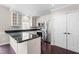 Updated kitchen with stainless steel appliances, a breakfast bar, and ample cabinet space at 2101 Piney Brook Rd # 105, Raleigh, NC 27614