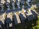 Neighborhood aerial view showcasing a mix of modern homes, mature trees, and well-maintained landscaping at 2123 Gregor Overlook Ln, Apex, NC 27502