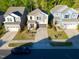 Beautiful aerial view of suburban neighborhood with well-maintained homes and landscaped front yards at 2123 Gregor Overlook Ln, Apex, NC 27502