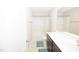 Bright bathroom featuring a shower/tub combo with a white vanity and blue accents at 2123 Gregor Overlook Ln, Apex, NC 27502